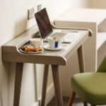 Close up of a desk with a laptop on at mercure hull grange park hotel