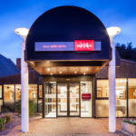 Exterior shot of the front of the mercure hull grange park hotel at dusk