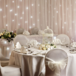 Close up of tables set for an ivory wedding theme in the garden suite at the mercure hull grange park hotel