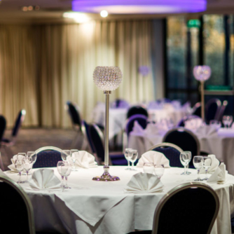 Close up of a table set for an event in the international suite at the mercure hull grange park hotel