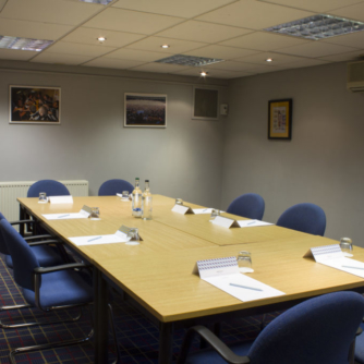 Table set for a meeting in the grange park room at mercure hull grange park hotel