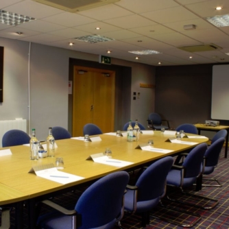 Table set for a meeting in the bridges suite at mercure hull grange park hotel