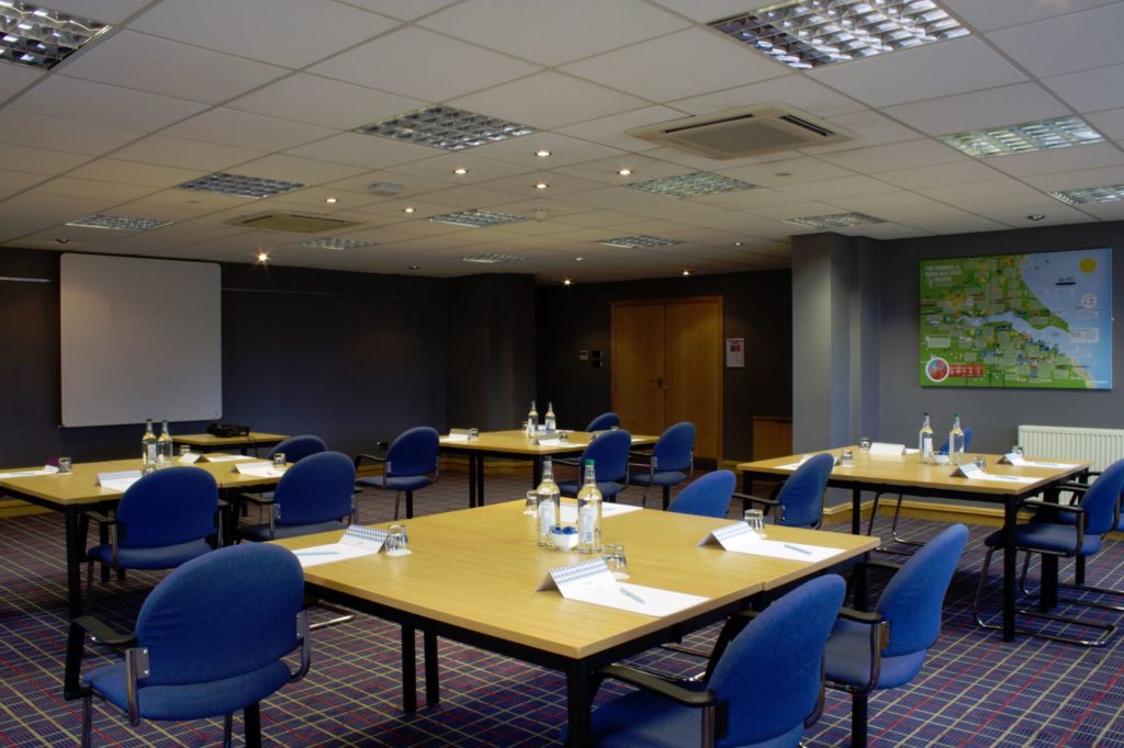 Table set for a meeting in city of culture room at mercure hull grange park hotel