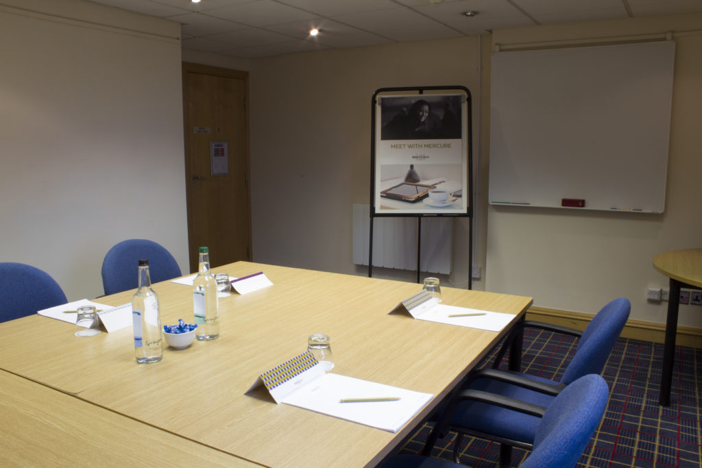 mercure-hull-grange-park-hotel-meetings-grange-suite Table set for a meeting in the grange suite at mercure hull grange park hotel